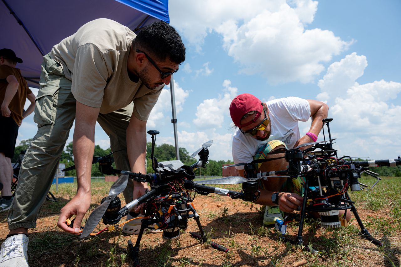SAPIENCE octocopter drone fleet in cooperative formation during an autonomous search and rescue mission